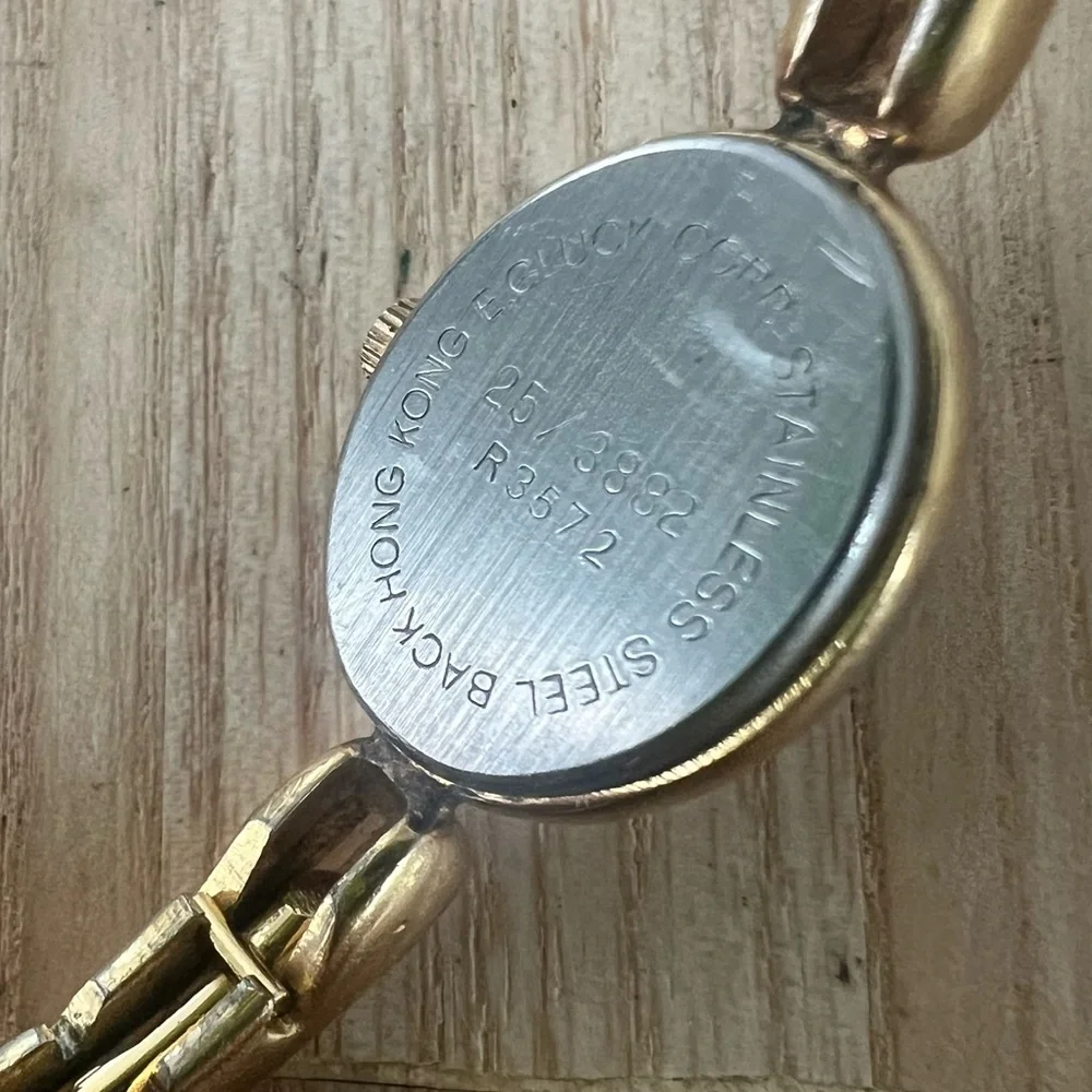 Vintage Armitron ladies oval gold tone bangle bracelet watch NEW BATTERY